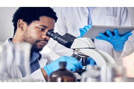 black-man-scientist-and-microscope-with-science-r-2023-11-27-05-15-31-utc (1).jpg